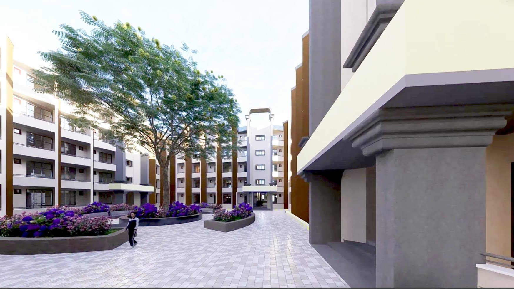 Central courtyard with gardens and seating between academic wings